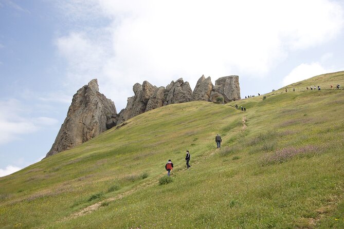 Beshbarmag mountain with sea view and Candy Mountains <em> Day Tour – A full day built around Azerbaijan’s unusual scenery’ /></p>
<p><p>This is a useful choice if you have only a few days in Baku and want to see more than the Old City and central boulevards. The route begins at 9:00 a.m. and takes you beyond the capital for three natural stops before returning to two major Baku landmarks.</p>
</p>
<p><p>The order gives the day a pleasant rhythm. You begin with a quick look at Masazir, spend more time at Candy Cane Mountain and Beshbarmag, then finish with architecture in the city. It is not a slow, single-site outing. You are collecting several strong impressions, each quite different from the last.</p>
</p>
<p><p>The tour lasts about eight hours. Pickup is offered from selected hotels, and the transport is air-conditioned, a welcome detail on a warm Azerbaijani day or after time outside in the sun. The group limit of 12 is also important. You are not signing up for a huge coach with long loading stops, though the exact pace can still depend on the group and road conditions.</p>
</p>
<div class="twil" style="margin: 20px 0; padding: 15px 0;"><p>More drives through the Candy Cane Mountains:</p><ul style="margin: 10px 0; padding-left: 0; list-style: none;"><li style="margin: 0 0 12px 0; padding: 0 0 12px 0; border-bottom: 1px solid #E0E4F3; line-height: 1.4;"><a href="https://theazerbaijanexplorer.com/baku-candy-cane-guba-khinaliq-village-with-homemade-lunch/">Baku: Candy Cane, Guba, Khinaliq village with Homemade Lunch</a><br><span style="font-size: 0.82em; color: #4A5A94;"><span style="color: #FFC300;">★</span> 4.9 &nbsp;&middot;&nbsp; 519 reviews</span></li><li style="margin: 0 0 12px 0; padding: 0 0 12px 0; border-bottom: 1px solid #E0E4F3; line-height: 1.4;"><a href="https://theazerbaijanexplorer.com/baku-guba-khinalig-candy-cane-tour-with-homemade-lunch/">Baku: Guba Khinalig & Candy Cane Tour with Homemade Lunch</a><br><span style="font-size: 0.82em; color: #4A5A94;"><span style="color: #FFC300;">★</span> 4.9 &nbsp;&middot;&nbsp; 447 reviews</span></li><li style="margin: 0; padding: 0; border-bottom: none; line-height: 1.4;"><a href="https://theazerbaijanexplorer.com/baku-candy-mountain-pink-lake-besh-barmag-dag-and-mosque/">Baku: Candy Mountain, Pink Lake, Besh Barmag Dag and Mosque</a><br><span style="font-size: 0.82em; color: #4A5A94;"><span style="color: #FFC300;">★</span> 4.6 &nbsp;&middot;&nbsp; 273 reviews</span></li></ul></div><h2>Masazir Lake and its pink morning color</h2>
<p><img width="669" height="446" decoding="async" src=