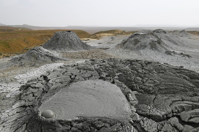Gobustan-Mud Volcan-Fire Temple and Mountain Tour/Entrance inc - Gobustan’s mud volcanoes are strange, rough, and memorable